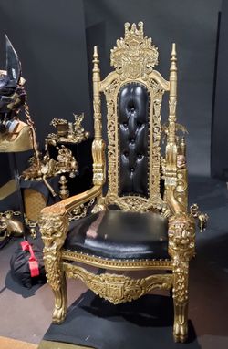 Black and gold throne chair