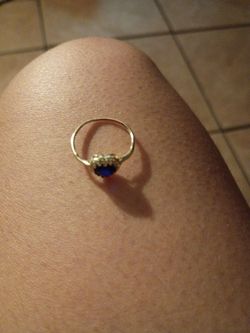 14k gold ring with sapphire heart shape