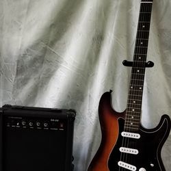 Like new electric guitar and new 20 watts amp