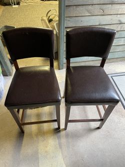 Brown leather barstools