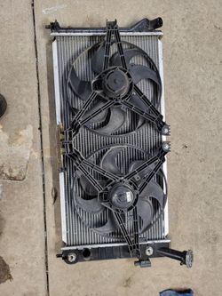 Radiator and electric fans