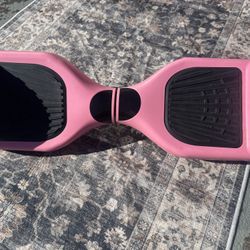 Pink hoverboard with charger (includes storage bag)