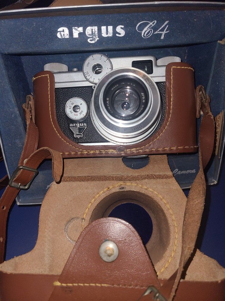 Vintage Cameras And Binoculars