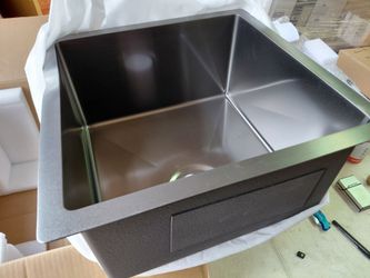 Glacier bay 17x17x9 drop in bar /kitchen sink with bottom grate in gunmetal black, has bend on one edge from shipping