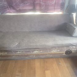 RV convertible couch into full size bed new cover original upholstery still mostly good just one cushion  need repair! Price to sell quicly