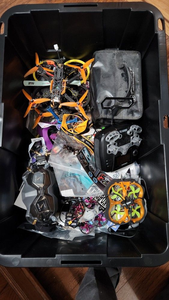 A Big Box Of Drones And Parts