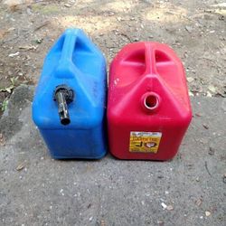 Two 5 gallon cans