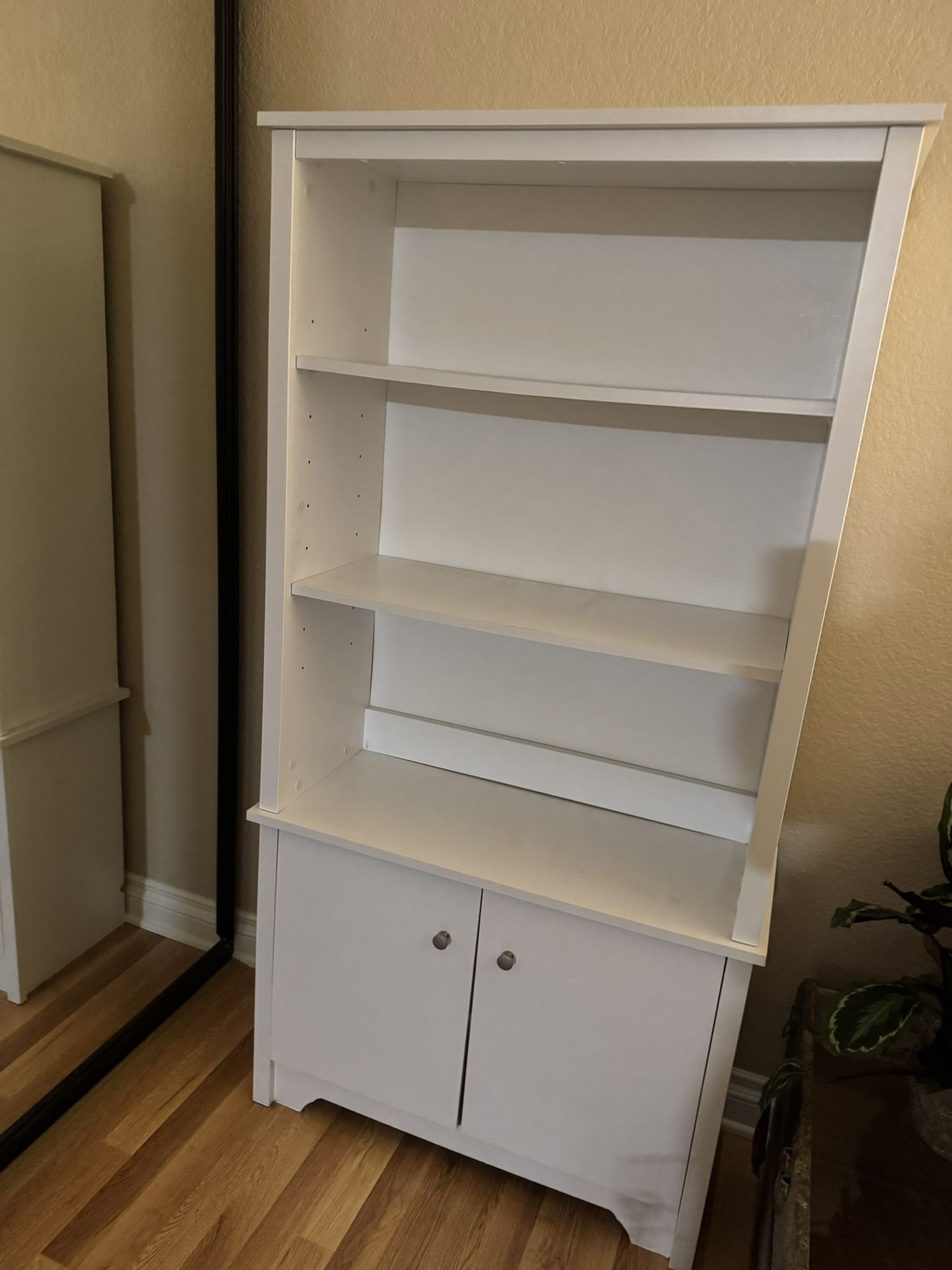 White shelves with cabinet