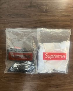 White and black supreme shirts