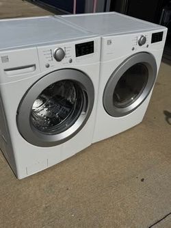 Front load kenmore washer and kenmore dryer high efficiency  working perfectly with warranty extra for delivery same same day delivery and installatio