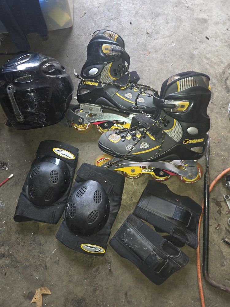 Size 8.5 Rollerblades,helmet And Pads.