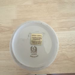 This item is a Lenox Charleston Collection compote pedestal dish, featuring a sunflower design in the center of the bowl.