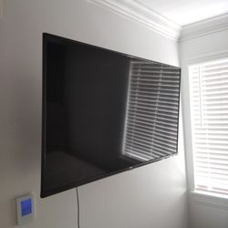 55-in TCL Smart TV With Wall Mounts And Legs! 