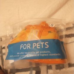 New soft cone for a small cat or dog with oranges on it five bucks after they have surgery keeping them from licking or ripping out their stitches pic