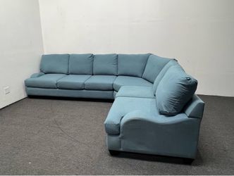 Living Spaces Teal Blue/Green cuddler corner contour arm. We deliver & setup.