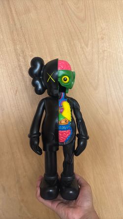 Kaws flayed open figure used