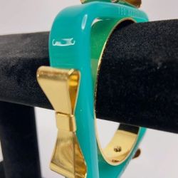 TED BAKER  BLEU OCEAN-GOLD BOWS BRACELET