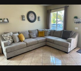 Beautiful Sectional couch from Jerome’s super Comfortable