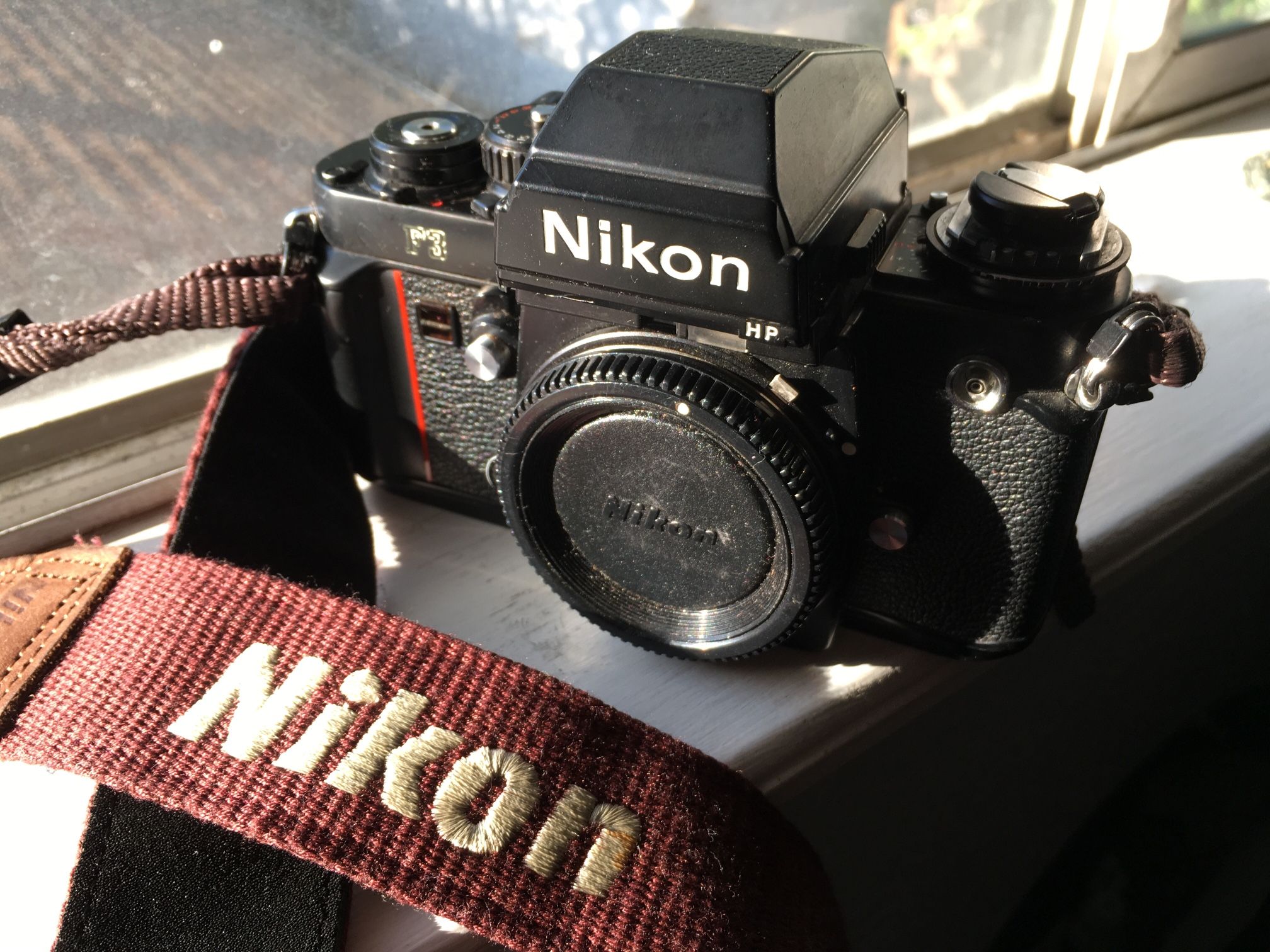 Nikon F3 HP w/ strap, SB 28DX Speedlight & flash adaptor
