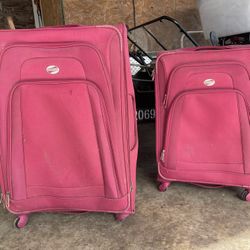 Pink Large And Medium Luggage