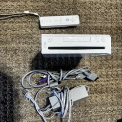 Wii with remote as well as games