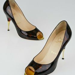CHRISTIAN LOUBOUTIN Tartaruga Leather Yoyospina