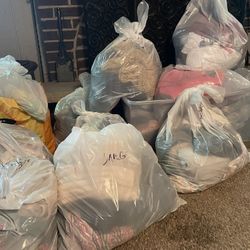 Bags Of Young Woman’s Clothes 