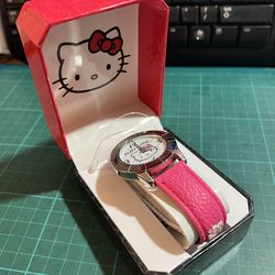Hello Kitty Watch, Silver Tone, Pink Strap, New In Box, never been used.