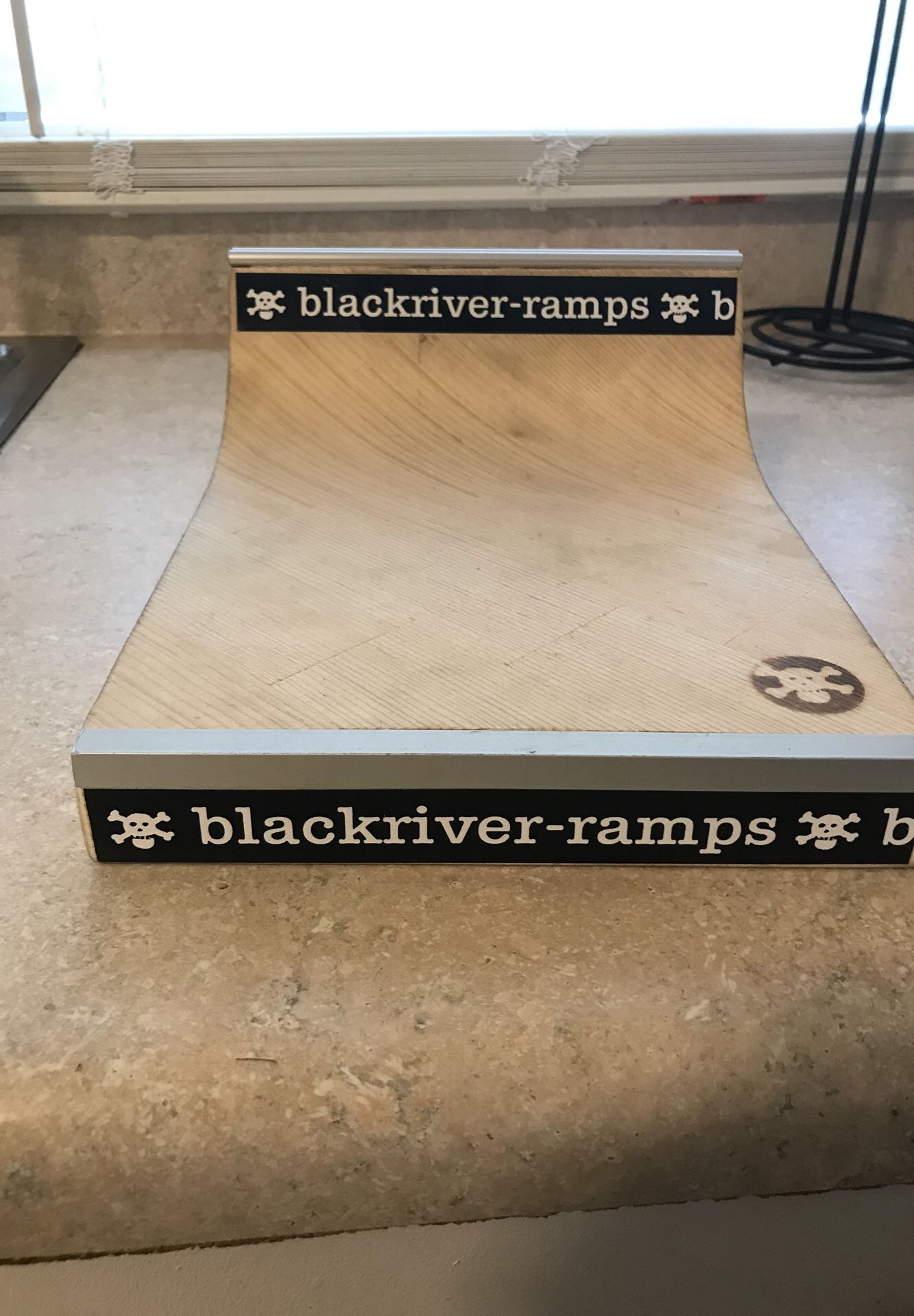 Finger boards and finger board ramps. The black river ramp is worth 40$ and the L rail is worth 30$ the yellow curb is worth 5$ the runa finger board