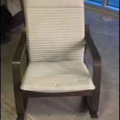 barely used super comfortable rocking chair with cushion
