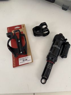 Rockshox super deluxe rear shock, oneup stem, bottle cage, mtb parts