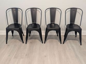 Black Tolix like metal chairs