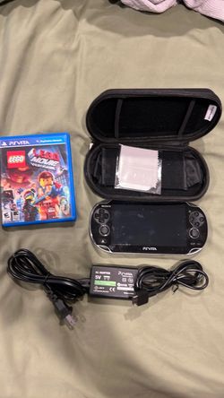 PlayStation PSVita console case and game