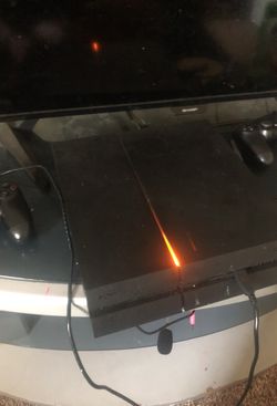 PS4 WITH 2 CONTROLLERS