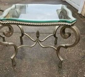 Glass  Top And Metal Base Coffee Table