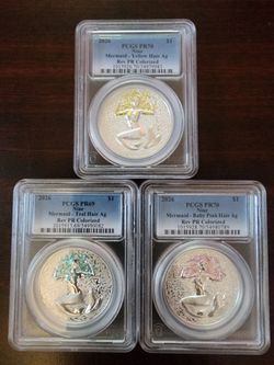PCGS $1 Silver Niue Mermaids Yellow, Teal & Baby Pink Hair Reversed Proof