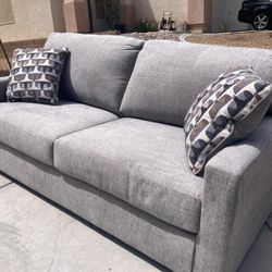 New Loveseat By Ashley 