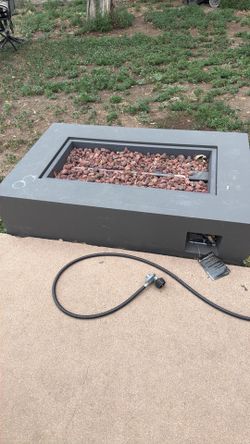 Real flame outdoor fire pit with lava rocks