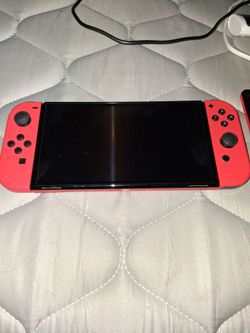 Nintendo Switch with Red Joy-Cons