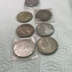 Morgan And Peace Silver Dollars