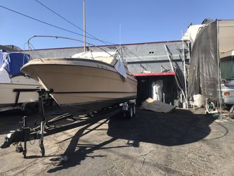 77 century 27’ with trailer