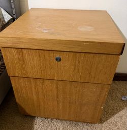 A pair of wooden side tables/night stands