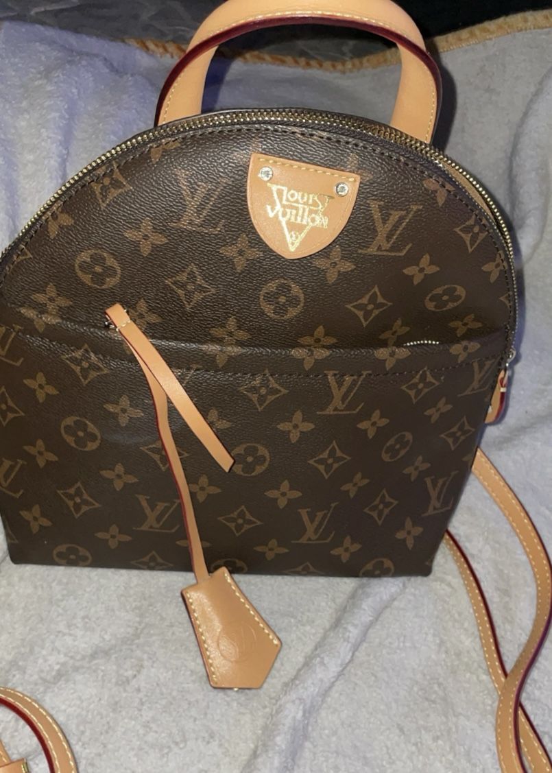 WOMEN’S Louis Vuitton Monogram Coated Mini Backpack 
