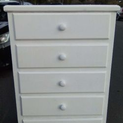 Tall solid wood dresser very well built thick wood. Read description