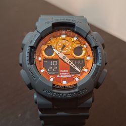 Casio G-SHOCK Gray and Orange Dial GA100FL-8A