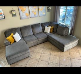 Beautiful Grey sectional couch with double chaise