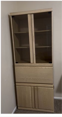 Tall Wood Cabinet with Glass Sliding Doors