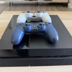 PS4 with games and controllers