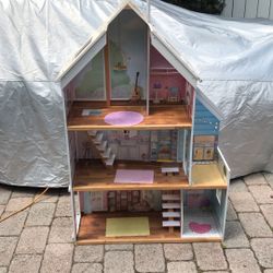 4 ft tall kidcraft  dollhouse gently used