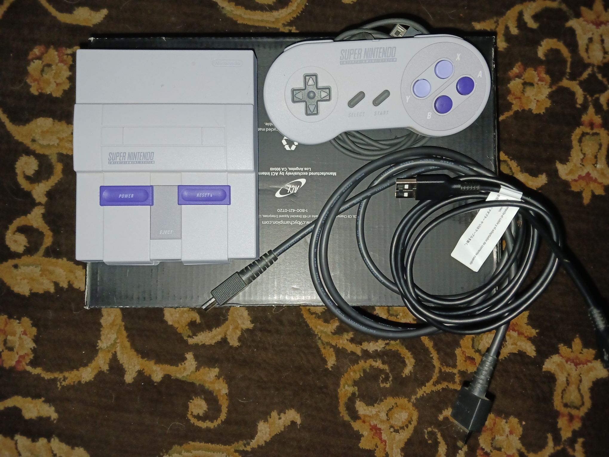 snes classic edition made by nintendo with 21 built in games (you just have to supply your own 5 volt usb block charger {who doesn't have one laying a